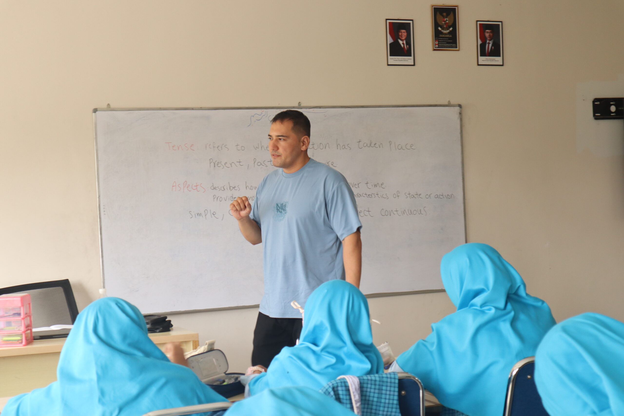 Three people are standing
